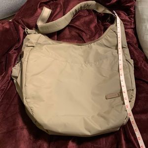 New & never used. Pacsafe exomesh shoulder bag / luggage add on